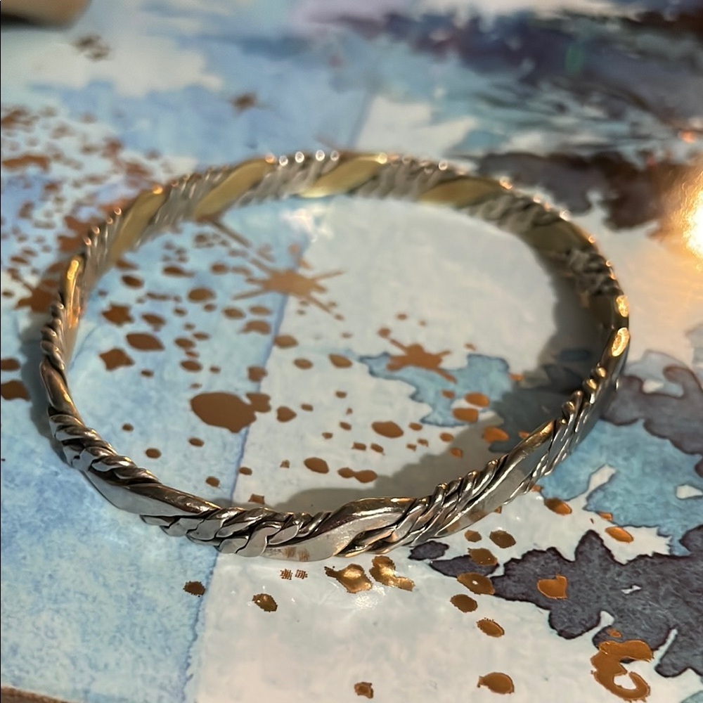 Elegant Silver and Gold Twisted Bangle